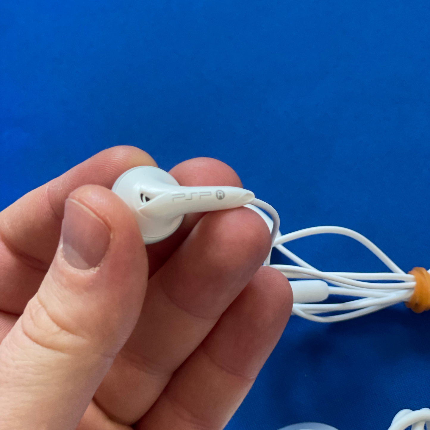 Originální sluchátka a remote control pro Sony PSP