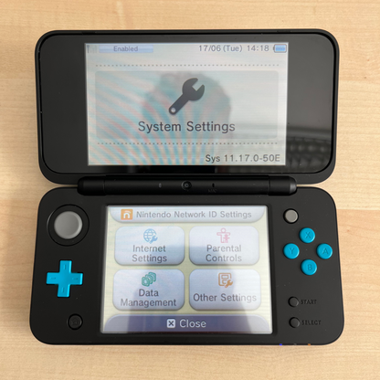 New Nintendo 2DS XL Black & Turquoise kompletní balení
